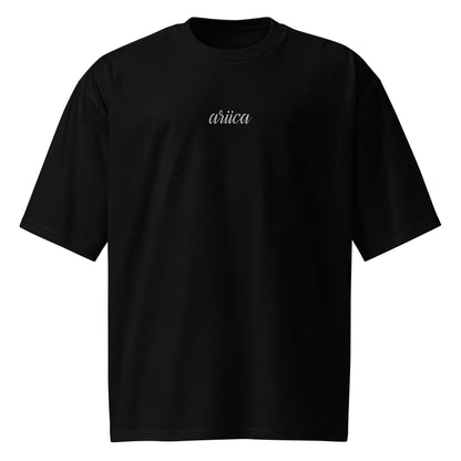 Oversized Black Heavyweight Tee with white Embroidery displayed on a ghost mannequin, showcasing minimalist luxury and relaxed fit