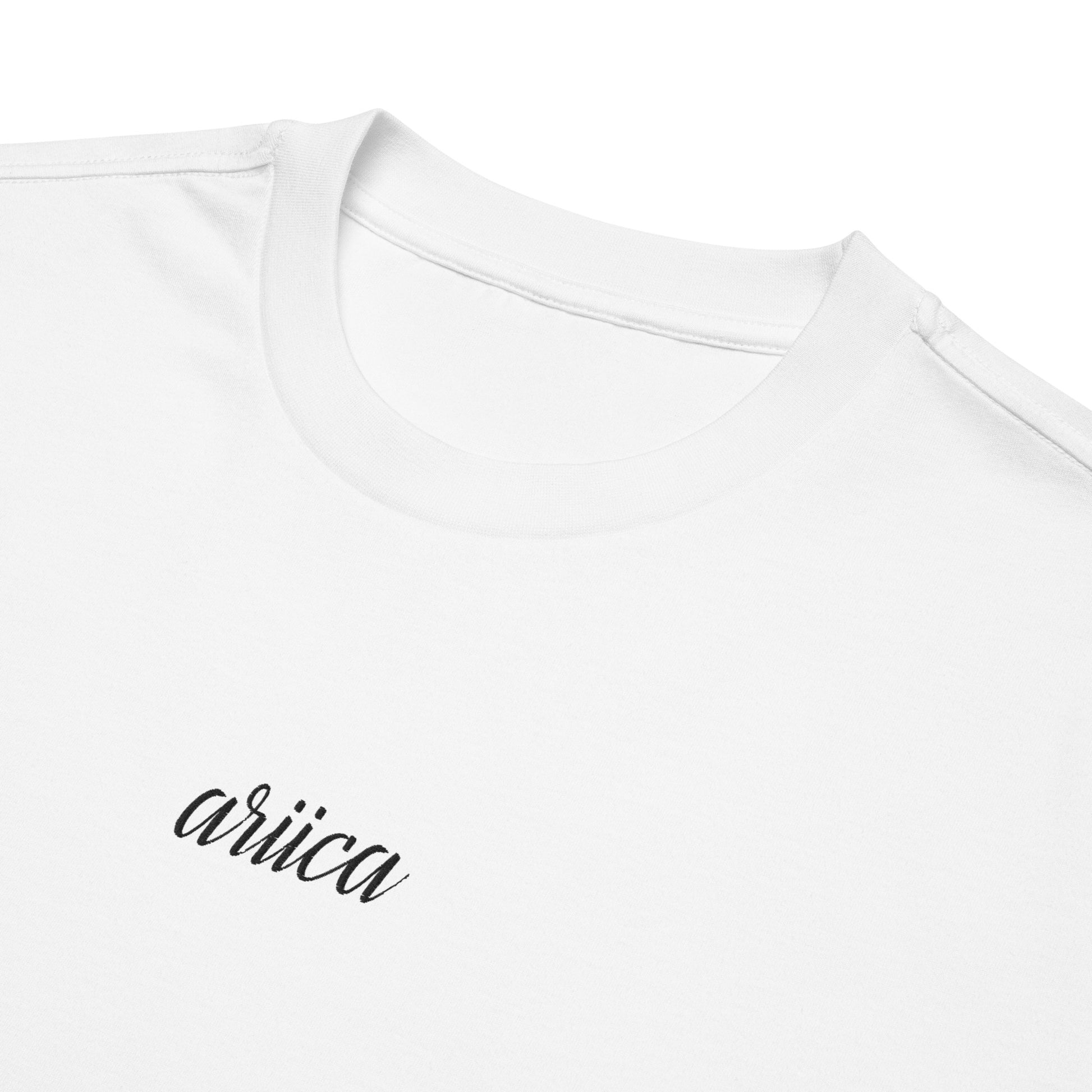 Close-up of the Oversized White Heavyweight Tee with intricate black Embroidery, highlighting premium detail and craftsmanship
