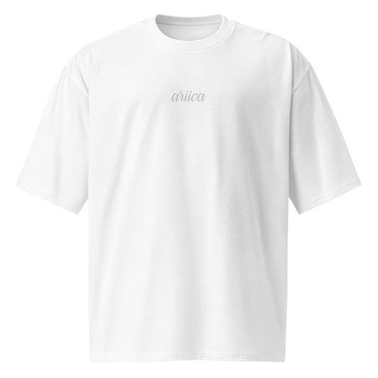 Oversized White Heavyweight Tee with white Embroidery displayed on a ghost mannequin, showcasing minimalist luxury and relaxed fit