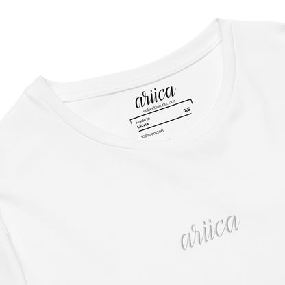 Close-up of the Premium White Cotton Tee with detailed white Embroidery, highlighting refined craftsmanship and quality stitching