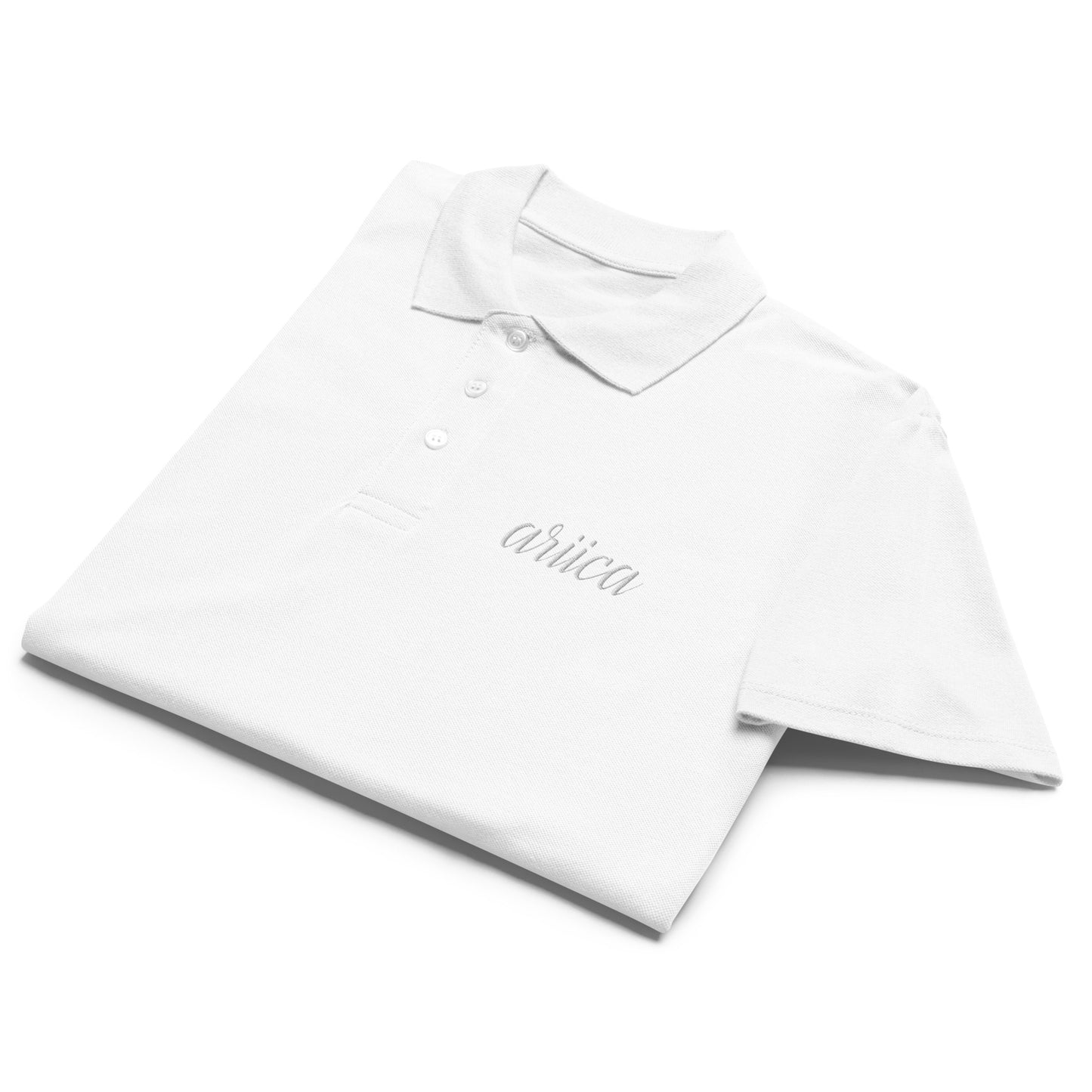 White Premium Polo Shirt with white embroidery, neatly folded to showcase its soft fabric and refined design.